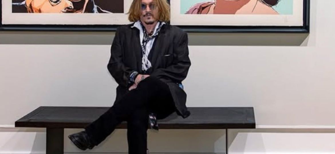 Johnny-Depp-sorprende-en-la-Comic‑Con-de-San-Diego-vestido-como-Ebenezer-Scrooge