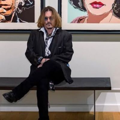Johnny-Depp-sorprende-en-la-Comic‑Con-de-San-Diego-vestido-como-Ebenezer-Scrooge